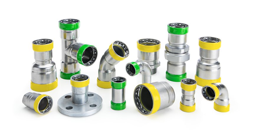 Group of carbon press fittings on a white background.